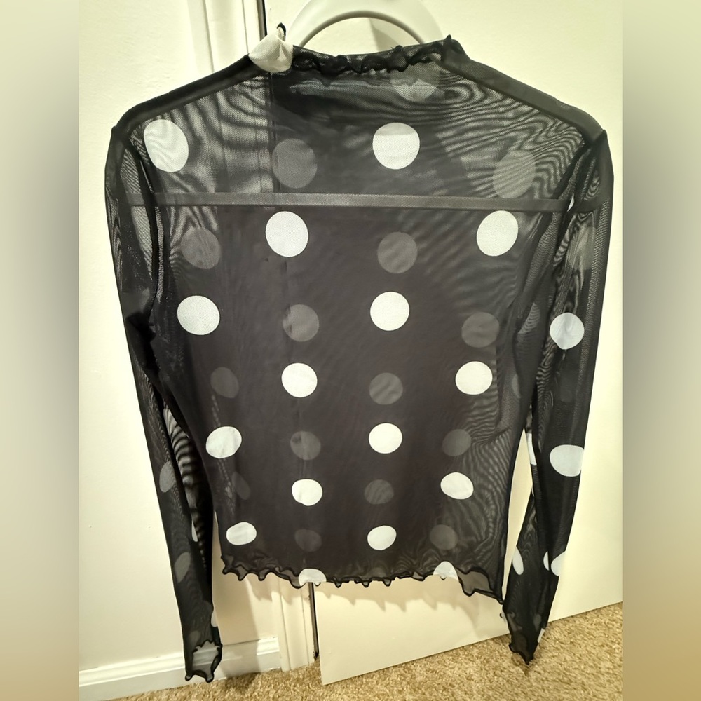 Dressed in LALA Polk a Dot mesh top 
Size small